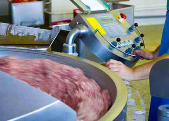 White castle worker using the ammonia refrigeration system at their processing facility