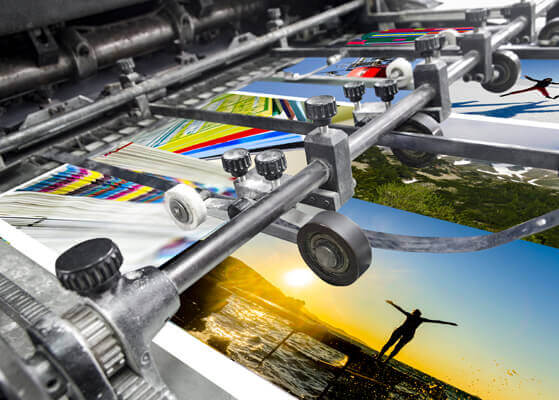 Close up of a printing machine at a print manufacturing facility