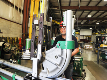 Shambaugh team member working on custom fabricated electrical materials