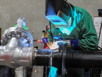 Shambaugh welder working on a custom fabrication project