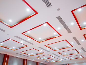 View of custom ceiling lights at a commercial facility