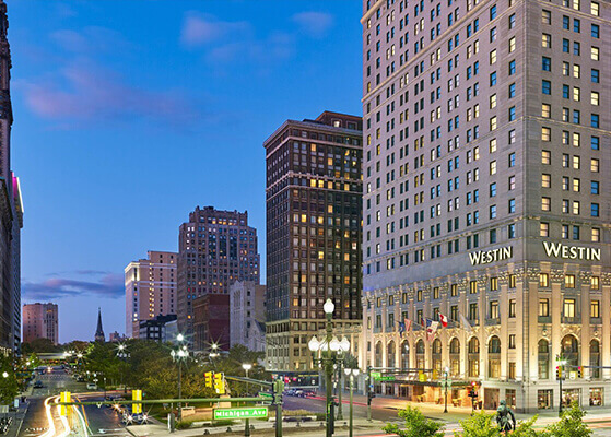 Nighttime exterior view of the Westin Hotel in downtown Detriot