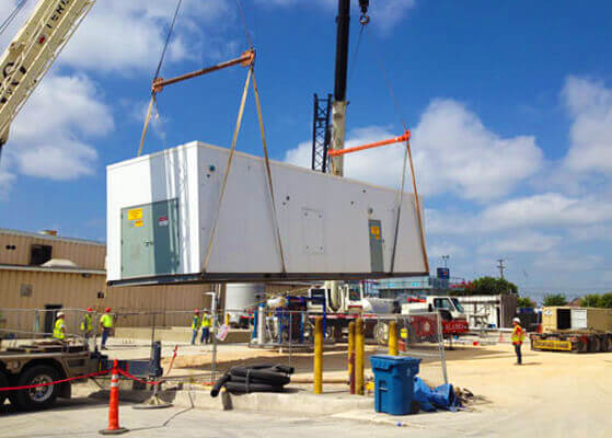 600-ton ammonia stand alone exterior engine room being lowered via crane at Pepsi's San Antonio plant