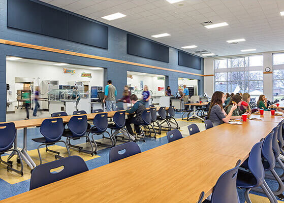 Students sitting in a middle school cafeteria